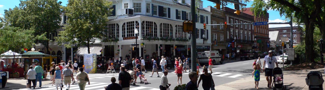 People walking across College Avenue