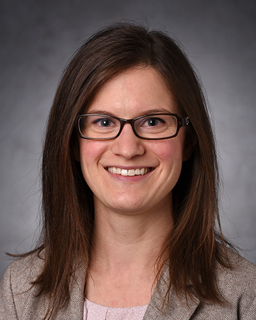 Headshot photo of brunette woman