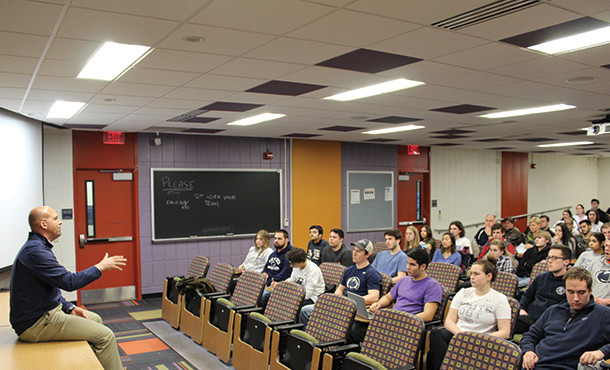 Coach James Franklin speaks with engineering leadership development students