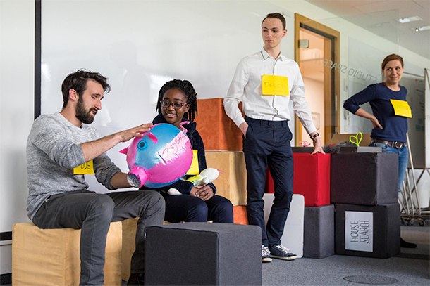 Andrea Sinkpon presents prototype to Design Thinking Week atteendees