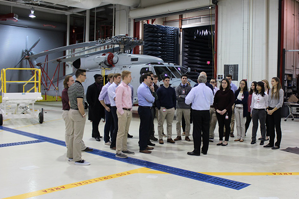 Students touring Lockheed Martin's air hangar