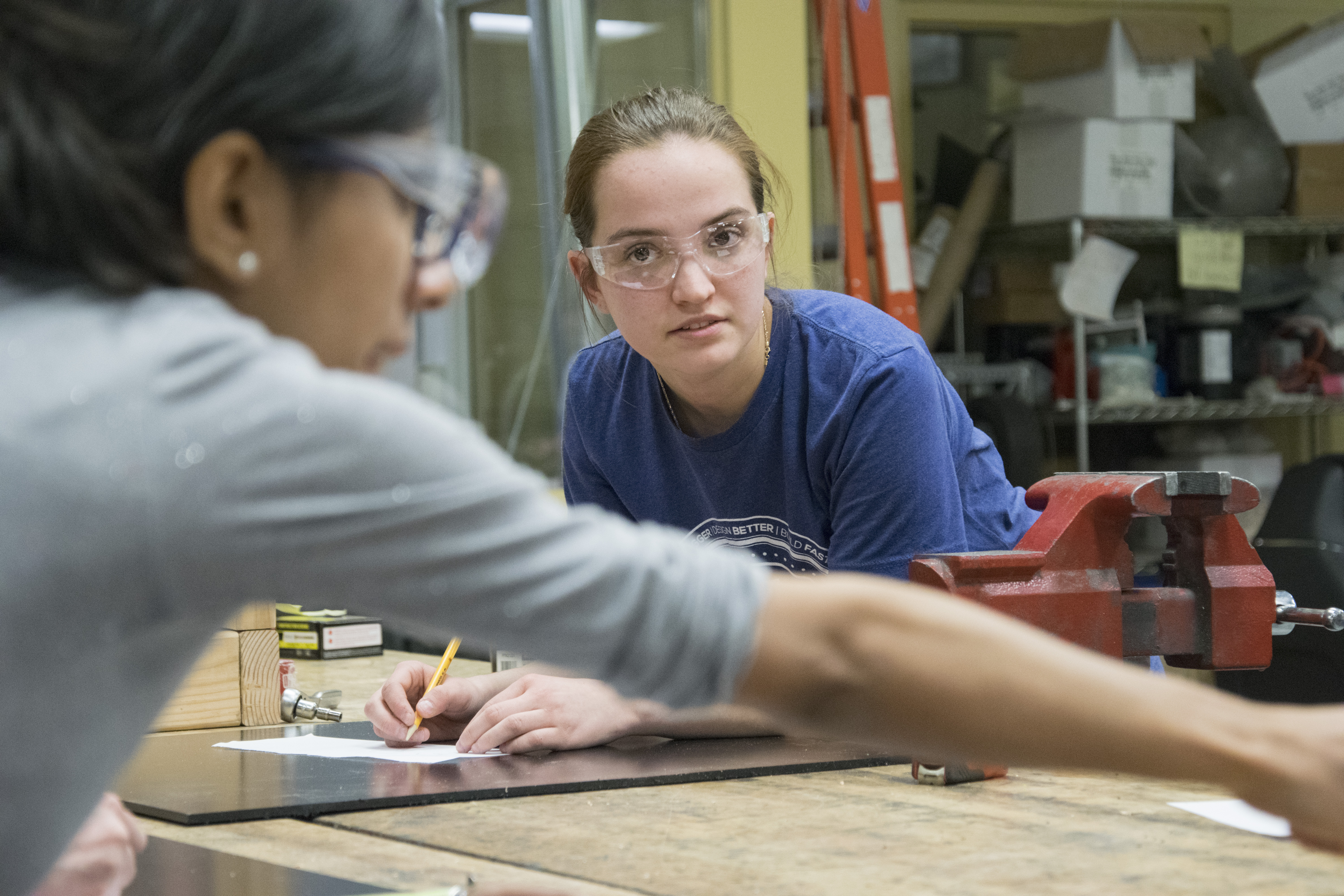 Female students work at the Learning Factory.