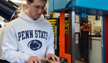 a student works on a project in the lab